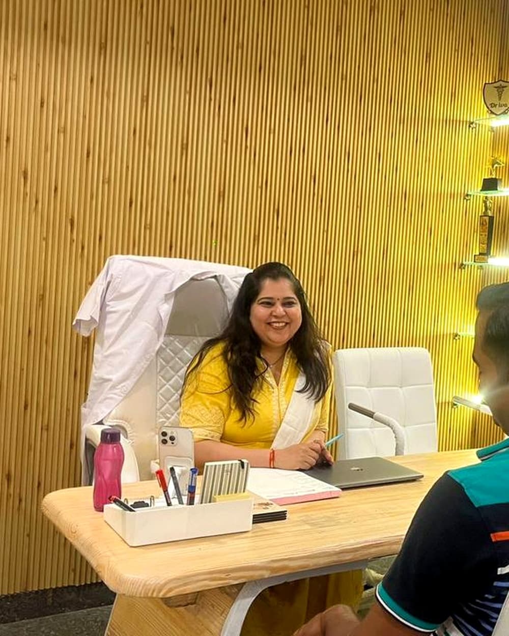 Dr. Iva Pathak in consultation with a patient at Rinova Hair Clinic, Lucknow
